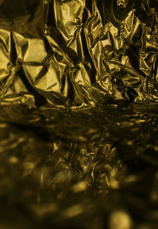 a close up of a shiny metal surface